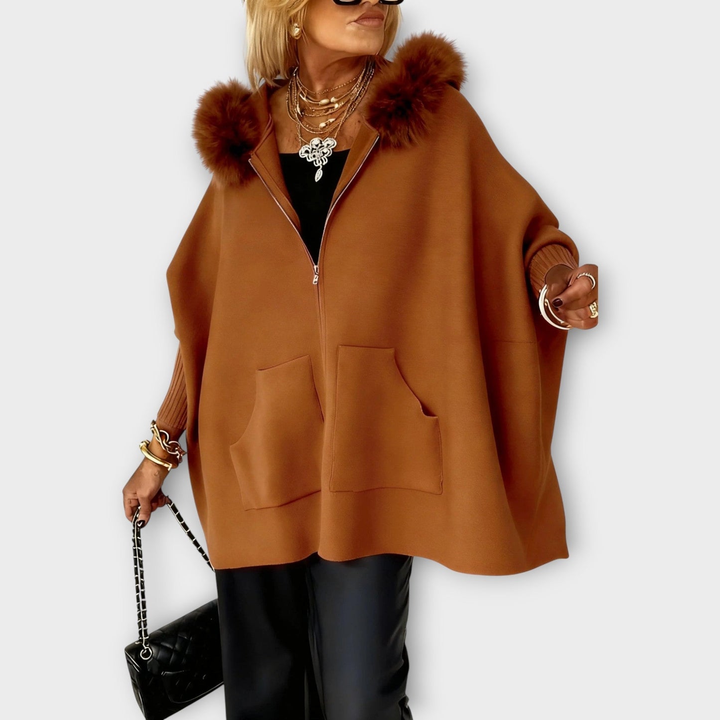 Cappotto con cappuccio in pelliccia sintetica di Lusso