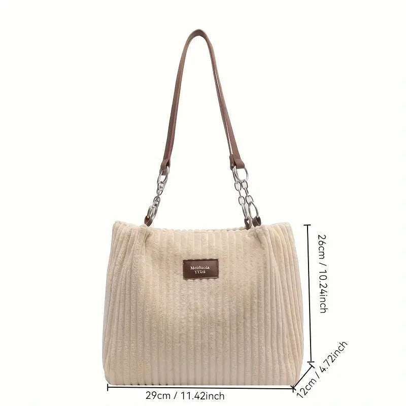 Alvhilde | Borsa morbida con texture a coste e elegante catena in metallo