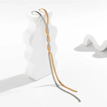 Flaira – Collana regolabile dorata con design serpente