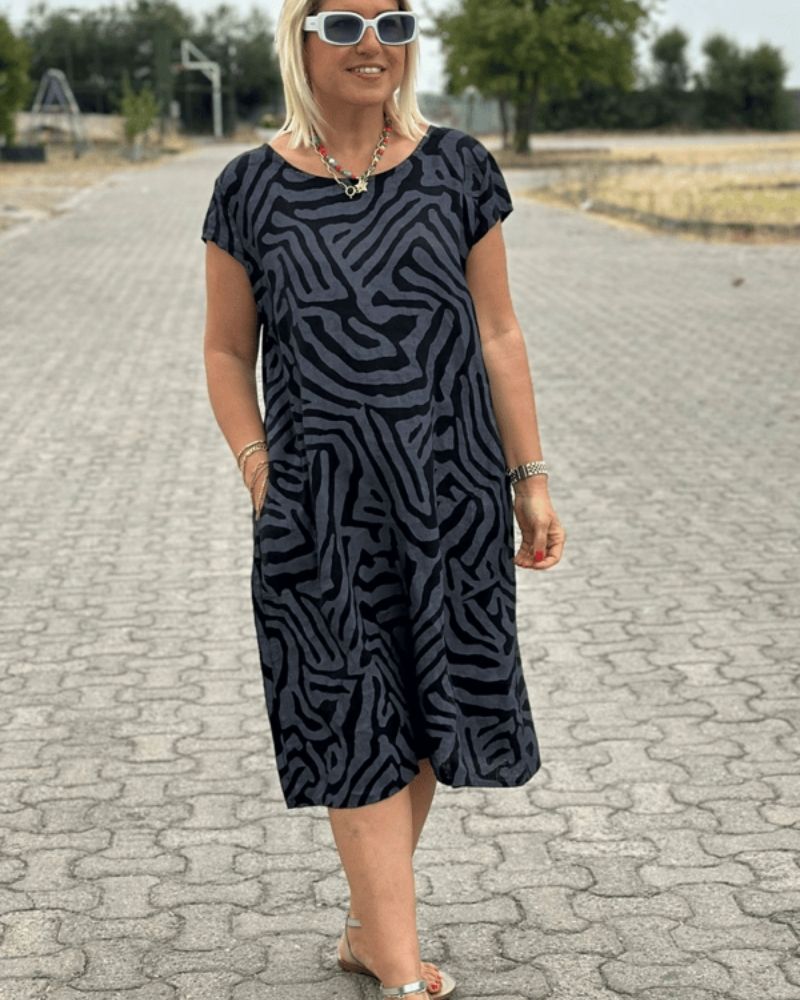 Abito estivo con collo rotondo - Eleganza senza tempo