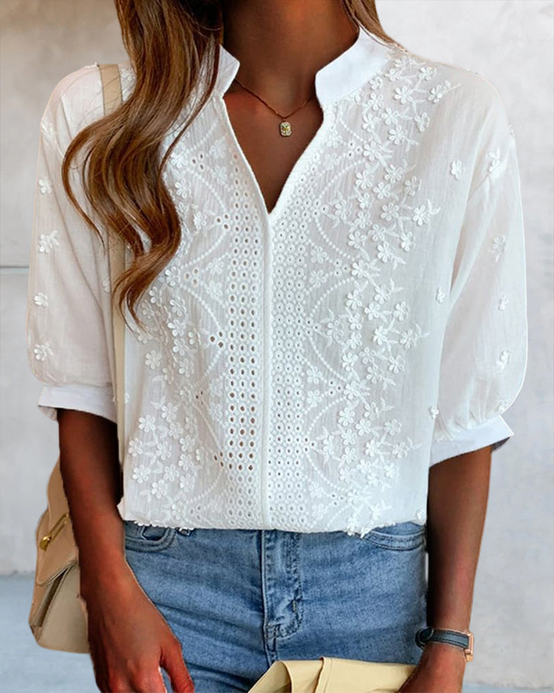 Blusa con scollo a V e maniche a palloncino con pizzo