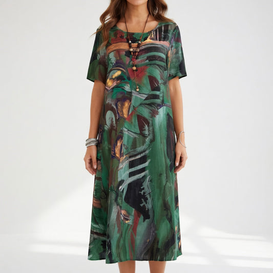 Abito lungo fluido con stampa artistico — Eleganza boho estivo