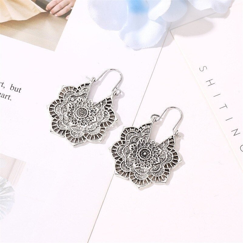 Orecchini con mandala di loto