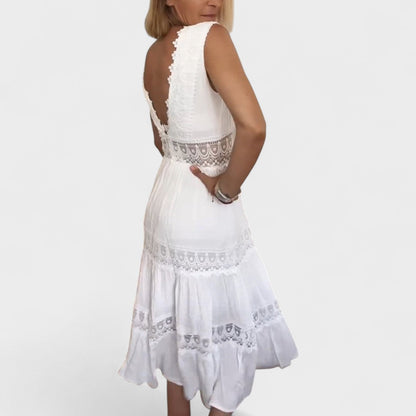 Patricia - Elegante abito in pizzo con collo a V