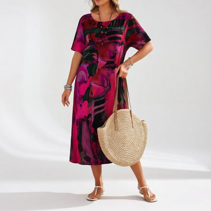 Abito lungo fluido con stampa artistico — Eleganza boho estivo