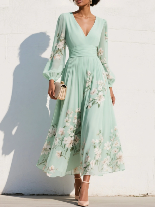 Cisella | Abito midi verde chiaro con scollo a V, in chiffon plissettato e motivo floreale