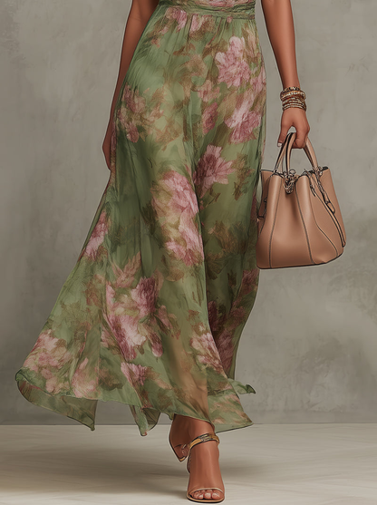Serena | Elegante abito lungo floreale fluido che valorizza la silhouette