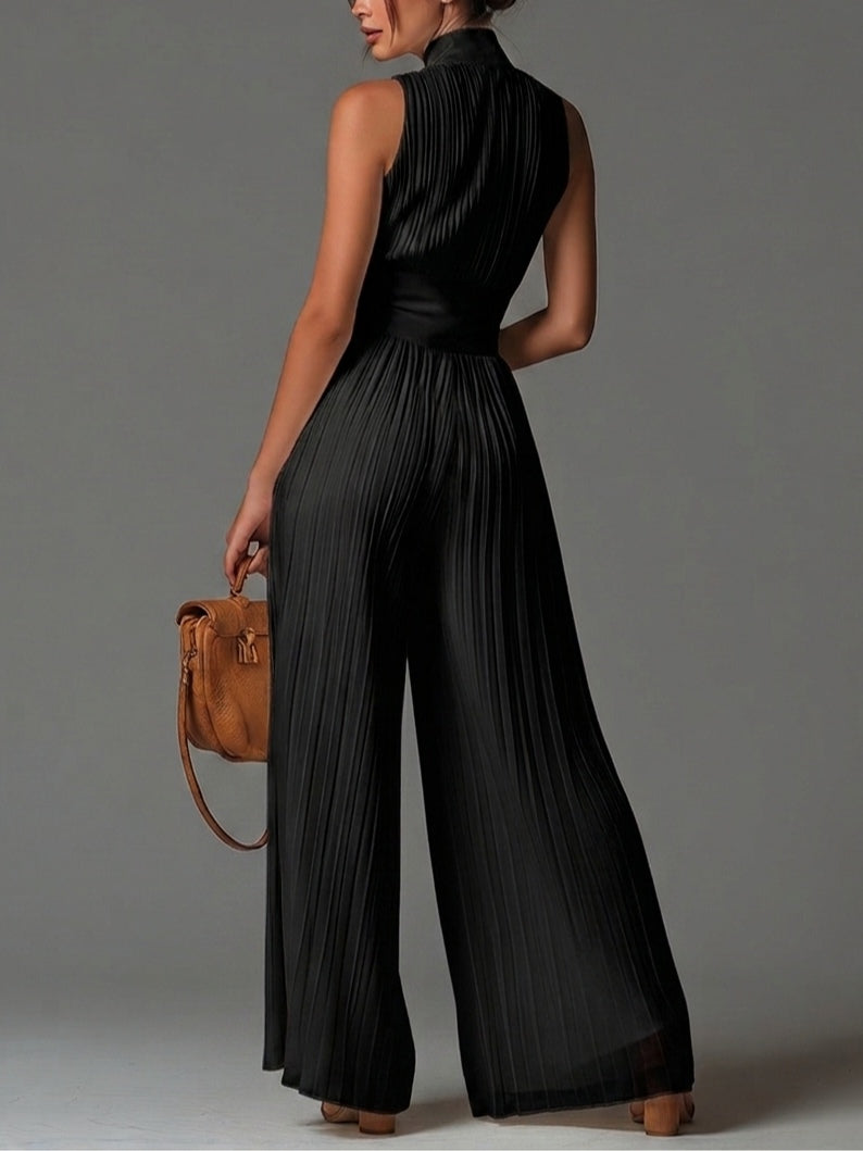 Jumpsuit senza maniche di collo a V nero con cerniera e plissettato di gambe larghe in chiffon