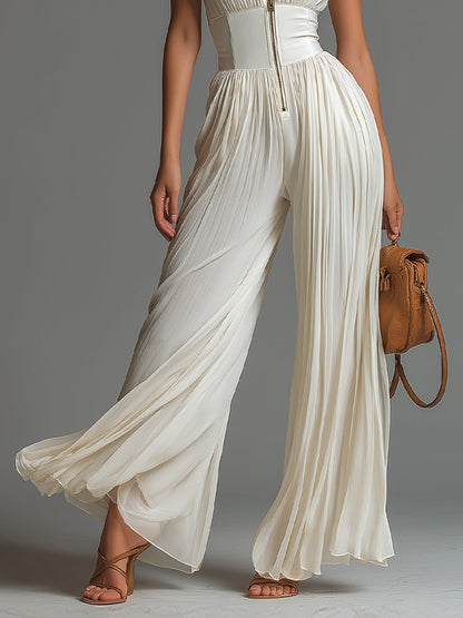 Jumpsuit senza maniche con scollo a V bianco, chiusura di cerniera, plissettato, pantaloni a gamba larga in chiffon