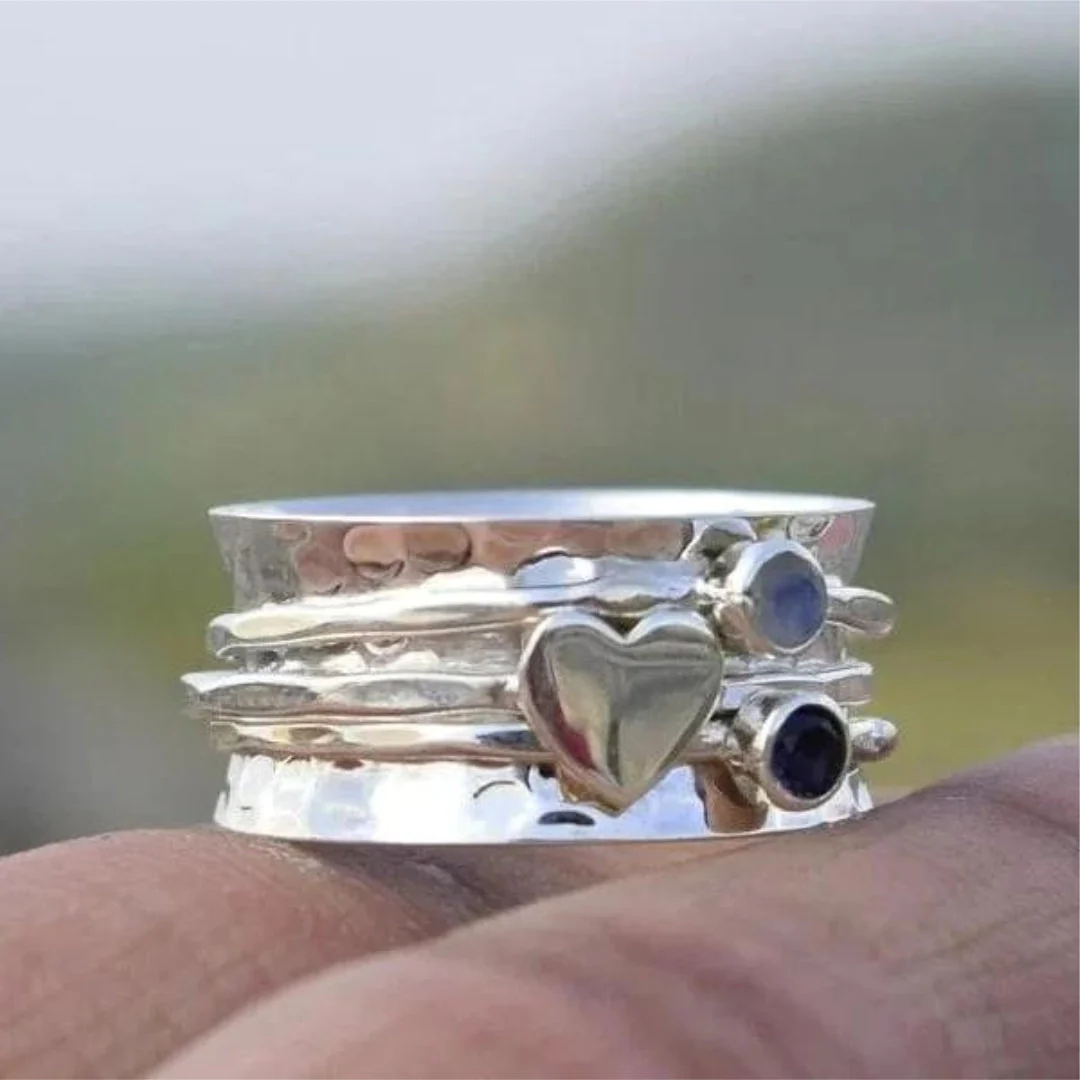 Anello elegante girevole a cuore in argento sterling