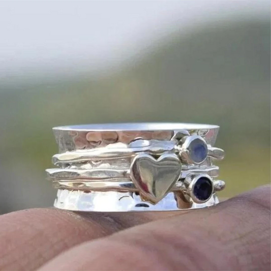 Anello elegante girevole a cuore in argento sterling