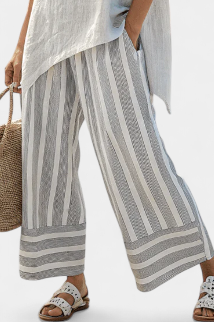 Talvora | Blusa Asimmetrica Elegante e Pantaloni Rayados