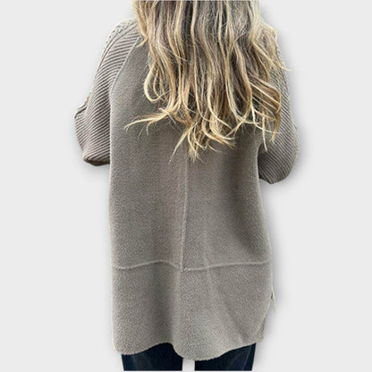 Cappotto invernale con dettagli in maglia chic e caldo e morbido